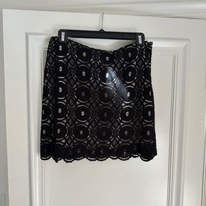 Robbi and Nikki black crochet mini skirt